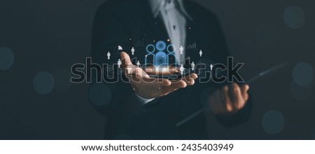 Concept of business network structure, customer relationship management CRM,Customer service ,Businessman showing person icon showing customer network or marketing strategy of corporate business.