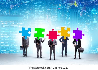 Concept of business people and jigsaw puzzle - Shutterstock ID 2369931227