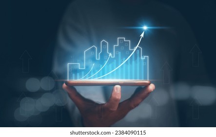 Concept of business prosperity and asset management, Real estate investment marketing analysis, Businessman holding mobile phone with graph of asset business growth, Planning to increase profits.