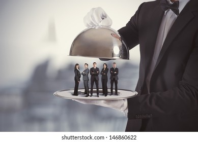 Concept of business service and First Class team - Powered by Shutterstock