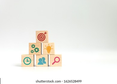 Concept Of Business Strategy And Action Plan. Wood Cube Block Stacking With Icon On White Background