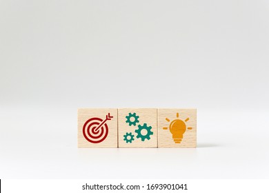 Concept Of Business Strategy And Action Plan. Wooden Cube Block With Icon On White Background