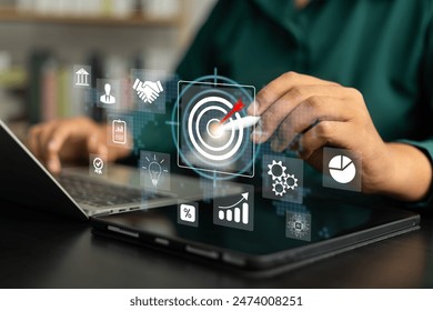 Concept of business strategy and future sustainable business finance action plan. Hand holding target board for creative and set up business objective target and success and business goals concept. - Powered by Shutterstock