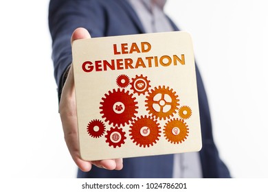 The concept of business, technology, the Internet and the network. Young businessman showing inscription: Lead generation