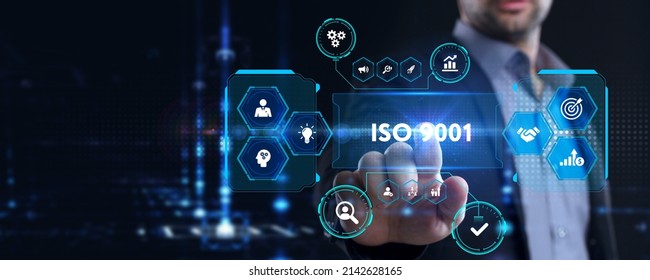 The concept of business, technology, the Internet and the network. A young entrepreneur working on a virtual screen of the future and sees the inscription: ISO 9001 - Shutterstock ID 2142628165