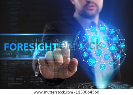 The concept of business, technology, the Internet and the network. A young entrepreneur working on a virtual screen of the future and sees the inscription: Foresight