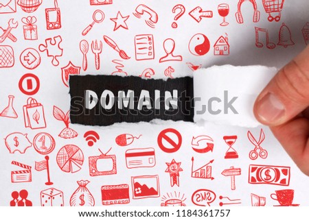 The concept of business, technology, the Internet and the network. Young businessman showing inscription: Domain