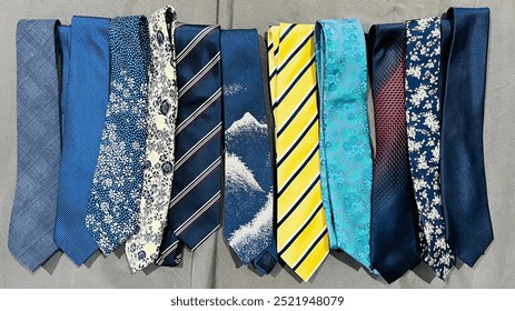 Concept of Businessman and necktie Collection. various colored men's ties fashion man accessories. A variety of neck ties. Colorful old ties close up.  - Powered by Shutterstock