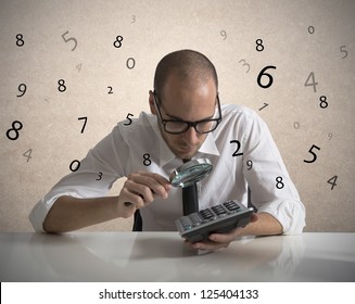 Concept of a businessman that checks the numbers and earnings
