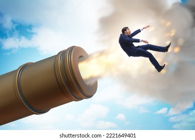 Concept with cannon and businessman