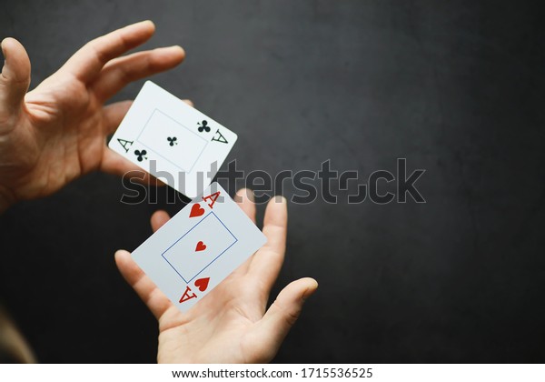 The concept card tricks and\
presentations. The concept of a sharpie in games. Flying cards in\
the air. A magician raises cards with the power of\
thought.