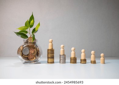 The concept of career growth and wealth increase. Wooden figurines stand on a ladder made of coins on a yellow background. red arrow pointing up - Powered by Shutterstock