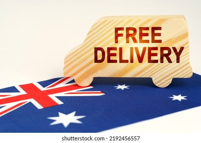 The concept of cargo transportation and logistics. On the flag of Australia is a truck with the inscription - Free delivery
