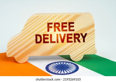 The concept of cargo transportation and logistics. On the flag of India there is a truck with the inscription - Free delivery