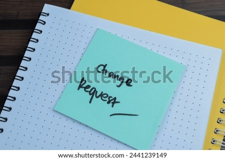 Concept of Change Request write on sticky notes isolated on Wooden Table.
