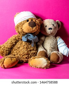 Concept Of Child Friendship At The Hospital With Two Ill Teddy Bears Together And Bandage For Education To Healthcare And Domestic Abuse