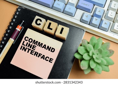 Concept of CLI - Command Line Interface write on sticky notes isolated on table.