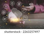 Concept of cloud technology on smartphone for back up and storage data. Man holding cloud computing technology .