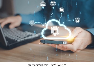Concept of cloud technology security system, online data storage. Man using cloud computing for back up and transfer electronic data via mobile phone.
