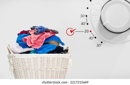 Concept Cold Washing Laundry. Basket With Dirty Laundry. Clothes In Rattan Basket. Dirty Laundry Ready For Washing Machine Control Panel Washing Machine With Displaying 20 Grad Celsius. Save Energy  