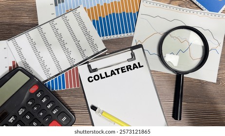 Concept of Collateral write on paperwork isolated on Wooden Table.