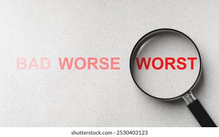 Concept of comparing quality and evaluation levels of business, customer service, or product. Worst wording in magnifying glass among worse and bad words on paper background.