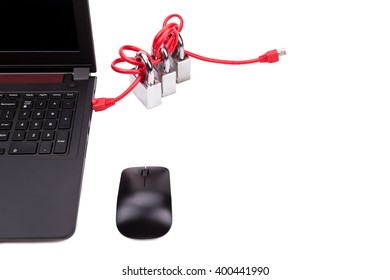 Concept of computer network security with triple padlocks over network cable connected to laptop computer