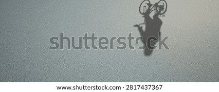 Concept or conceptual background of floor texture surface with a human shadow as silhouette. A 3d illustration metaphor for biking recreation workout, healthy lifestyle for fun leisure cycling design