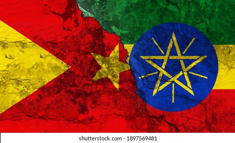 Concept Of A Conflict In The Ethiopian Region Of  Tigray With Painted Flags On A Wall With A Crack