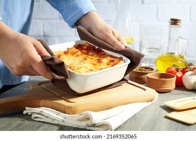 Concept of cooking, composition of cooking Lasagna on gray textured table - Shutterstock ID 2169352065