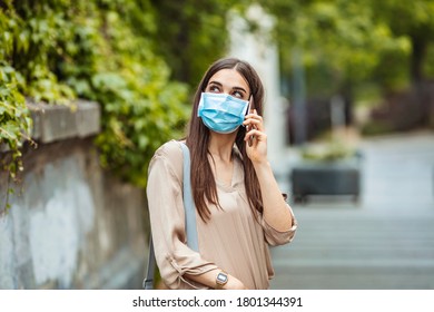 Concept Of Coronavirus COVID-19. Schoolgirl Wearing Medical Face Mask To Health Protection From Influenza Virus. Student Girl With Backpack And Books - Outdoors Portrait. Student Girl Back To School.