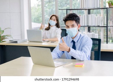 Concept Corporate Couple Business People, Businessman Confident With Facemask And Employees Beautiful Office Woman Are Present Talking About A New Financial Company's Project. Professional Teamwork. 