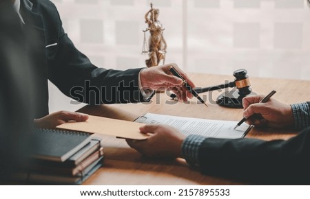 Concept of corruption, bankruptcy court, bail, crime, bribery, fraud, Judge Gavel, soundboard and a handful of cash on the table. Foto stock © 