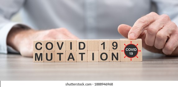 Concept Of Covid-19 Mutation On Wooden Cubes