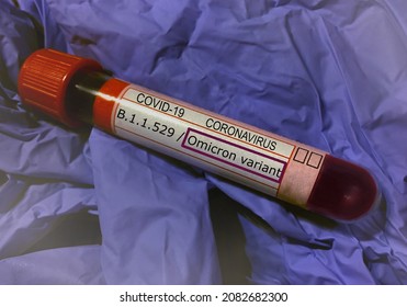 Concept For Covid19 New Variant Named Omicron - Laboratory Blood Tube Test With Tag Mentioning Omicron Variant. Concept For Quarantine, Restrictions, Covid Pandemic, Vaccine.