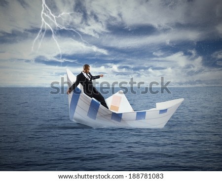 Concept of crisis and economic collapse with sinking boat