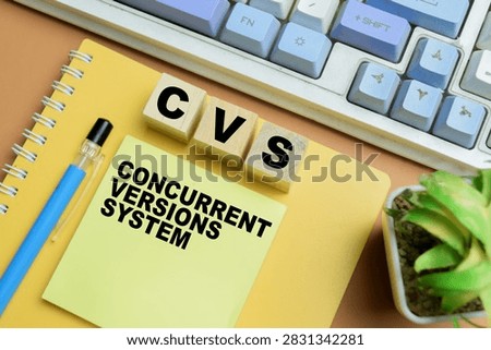 Concept of CVS - Concurrent Versions System write on sticky notes isolated on table.