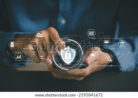 Concept of cyber security, information security, and encryption, secure access to user's personal information,  Man using his mobile selects the icon security on the virtual display. cybersecurity.vpn