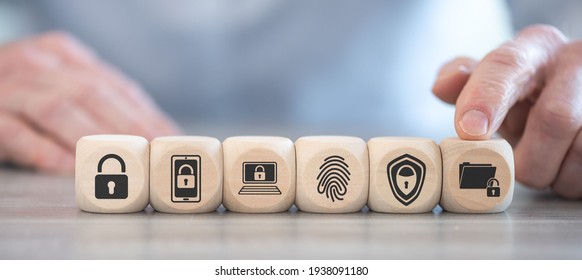 Concept of data protection with icons on wooden cubes - Powered by Shutterstock