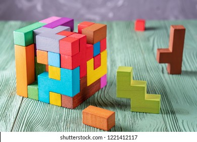 Concept of decision making process, creative, logical thinking. Geometric shapes in different colors. Choose correct answer. Logical tasks. Conundrum, find the missing piece of the proposed.