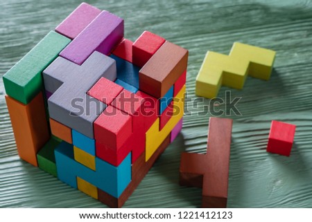 Concept of decision making process, creative, logical thinking. Geometric shapes in different colors. Choose correct answer. Logical tasks. Conundrum, find the missing piece of the proposed.