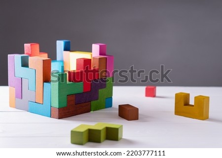 Concept of decision making process, creative, logical thinking. Geometric shapes in different colors. Choose correct answer. Logical tasks. Conundrum, find the missing piece of the proposed.