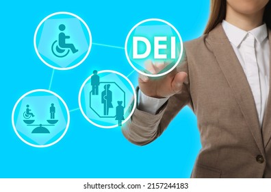 Concept Of DEI - Diversity, Equality, Inclusion. Virtual Screen With Different Icons And Businesswoman On Turquoise Background, Closeup