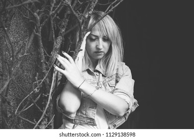 Concept of depression is despondency and sadness. Problems with women. The concept of fear and horror. Lonely sad simple woman in confusion