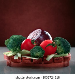 Concept Design Image For Cookbook Or Magazine Cover Vegetables On A Wooden Platter On A Dark Background