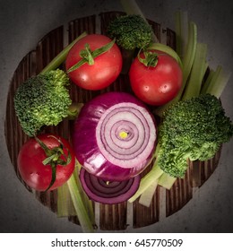 Concept Design Image For A Cookbook Or Magazine Cover Vegetables On A Wooden Platter On A Dark Background