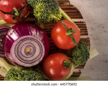 Concept Design Image For A Cookbook Or Magazine Cover Vegetables On A Wooden Platter On A Dark Background