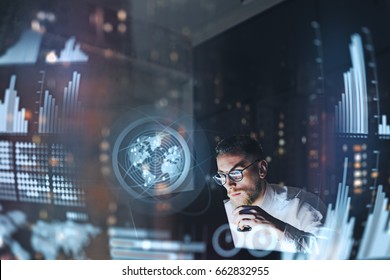 Concept of digital diagram,graph interfaces,virtual screen,connections icon.Young entrepreneur working at modern office.Man using contemporary laptop at night,blurred background.Horizontal - Shutterstock ID 662832955