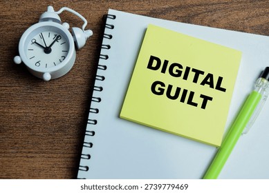 Concept of digital guilt write on sticky notes isolated on Wooden Table.