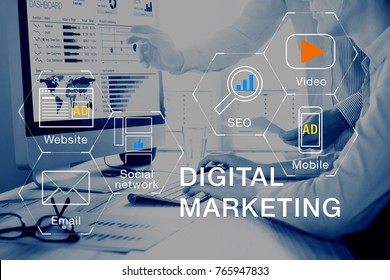 Concept of digital marketing media (website ad, email, social network, SEO, video, mobile app) with icon, and team analyzing return on investment (ROI) and Pay Per Click (PPC) dashboard in background - Shutterstock ID 765947833
